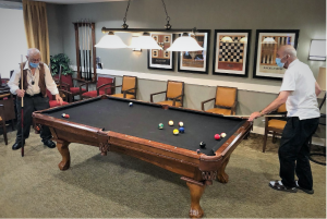 Residents playing pool