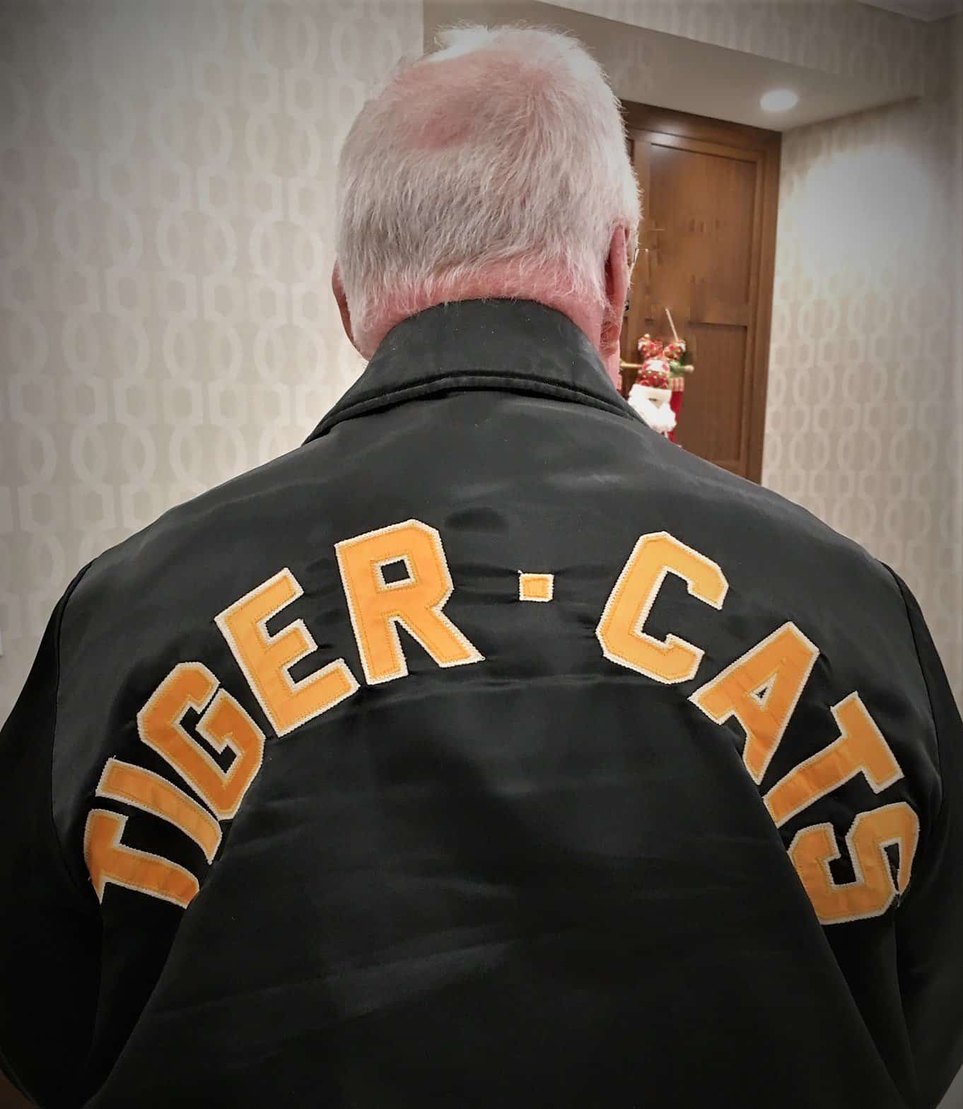 Head-To-Head: Which Retirement Residence Has the Grey Cup Edge? - All Seniors Care Old man wearing a tiger-cats jacket