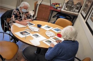 Pandemic Fatigue: Minding Your Mental Health - All Seniors Care Residents at table